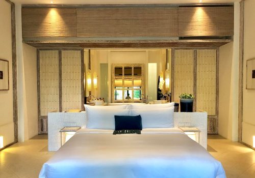 luxury-bedroom-interior-with-rich-furniture-scenic-view-from-walkout-deck_1258-111483